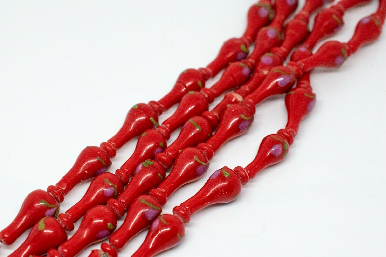 11 Handgearbeitete Muranoglasperlen in rot mit Abbild einer Pflanze Ø 9,5mm